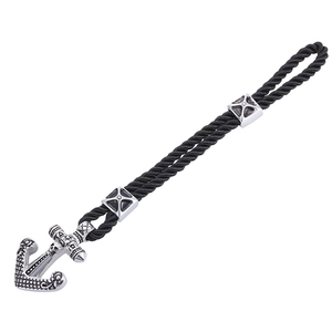 Punk black braided leather anchor bracelet for men with silver skull charm detail