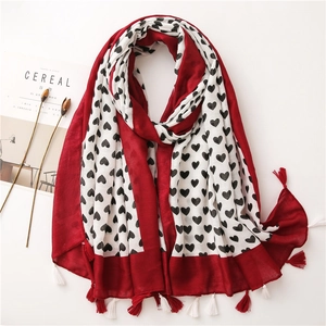 Long linen cotton scarf for women with black heart prints and red fringe tassels