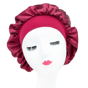 Elastic wide band satin sleep cap in burgundy for hair care on white model head