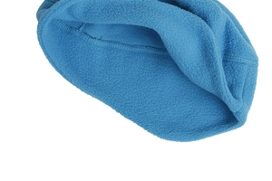 Detail view of bright blue fleece fabric texture and stitching for winter sports cap