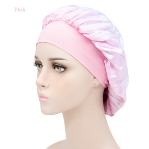 Pink satin sleep cap with wide elastic band for hair care and beauty protection