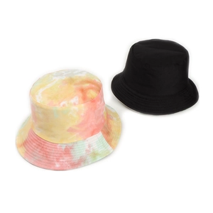 Detail showing colorful tie-dye bucket hat alongside a classic solid black bucket hat