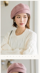 Detail of pink woven texture on a classic newsboy cap with soft knit material