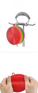 Close-up of flexible silicone dish brushes with hanging holes and durable bristles