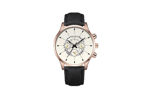 Detail of rose gold quartz watch with three-eye dial and black leather strap