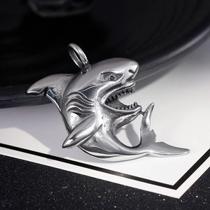 Polished titanium steel shark pendant for men on a minimalist black and white background