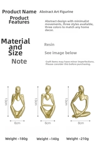 Macro view of minimalist resin abstract character sculptures in matte gold finish