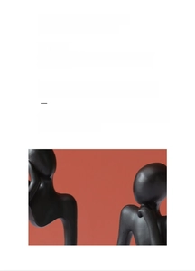 Detail of modern black abstract resin thinkers figurines with matte finish on clay background
