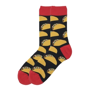 Detail of knit crew socks in black with red accents and yellow taco patterns