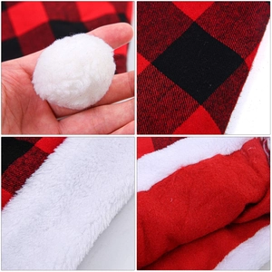 Red and black plaid flannel Santa hat with white faux fur cuff and plush pom-pom details