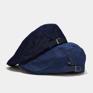 Vintage washed denim cadet caps in dark and medium blue with adjustable brass buckles