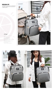 Detailed views of grey diaper backpack shown handheld and attached to stroller
