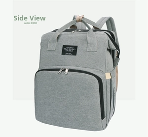 Side view of large capacity gray diaper backpack with durable fabric and sturdy zippers