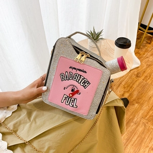 Creative silver sequin oil drum handbag with pink lettering and golden chain strap