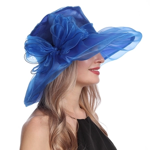 Detail of royal blue organza sun hat featuring an elegant layered floral bow decoration