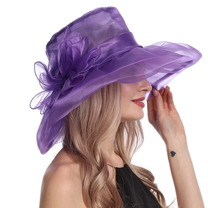 Detail of elegant purple organza sun hat featuring large handmade floral decoration