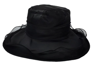 Detail view of black organza wide brim sun hat featuring layered wavy edge and bow
