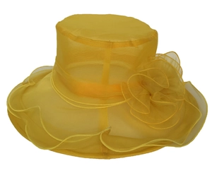 Detail of yellow organza sun hat featuring a large multi-layer floral decoration