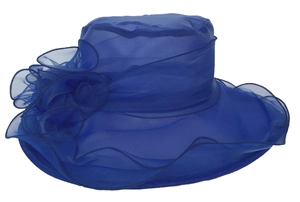 Detail of royal blue organza sun hat featuring multi-layered floral decor and wavy brim