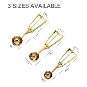 Three golden stainless steel ice cream scoops with spring handles in 4cm, 5cm, 6cm sizes