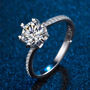 Macro shot of a six-prong heart-shaped setting with a round brilliant cut moissanite stone