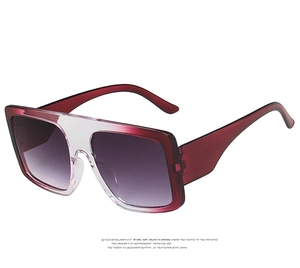 Front view of oversized square sunglasses featuring gradient purple frames and grey lenses