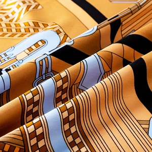 Hand-rolled 90cm silk scarf with equestrian horse saddle and leather belt print in blue and gold