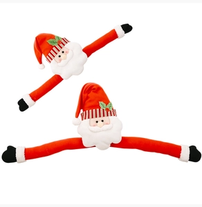 Detail of Christmas Santa plush huggers with long arms for tree or curtain decoration