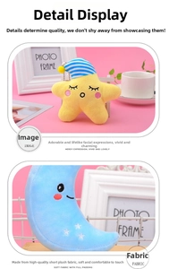 Close-up of yellow star and blue moon plush charms with cute embroidered expressions