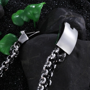 Handwoven black leather and stainless steel bracelet for men with polished silver clasp