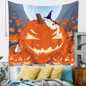 Detail of Halloween tapestry with a cat sitting on a pumpkin against a blue moon background