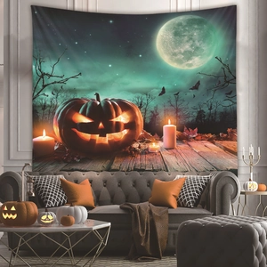Detail of Halloween tapestry with pumpkin and full moon in a cozy living room setting