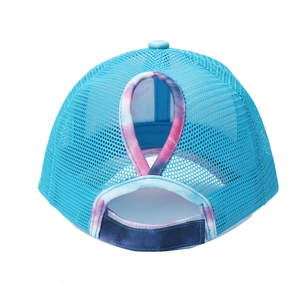 Detail view of the breathable mesh back and ponytail opening on a tie-dye baseball cap