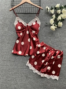 Polka dot satin sleepwear set in burgundy with white lace trim and elastic shorts