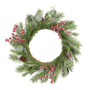 Christmas wreath with artificial pine needles, red berries, cones and eucalyptus leaves