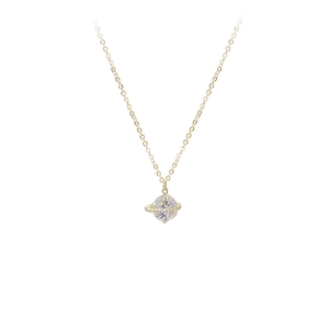 Elegant rose gold Saturn necklace featuring a large sparkling cubic zirconia planet pendant