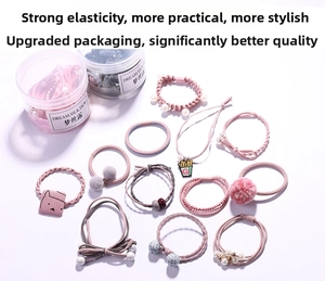 Detailed set of pink elastic hair ties featuring cute charms in transparent jars