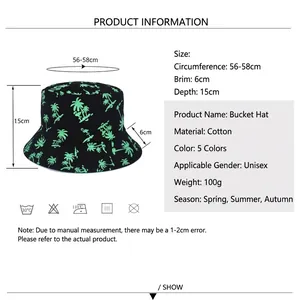 Double-sided bucket hat with palm tree print and detailed size chart specification