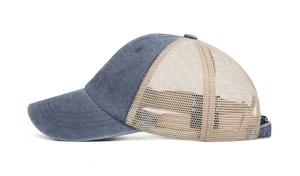 Detailed side view of breathable mesh trucker hat with adjustable strap and contrast stitching
