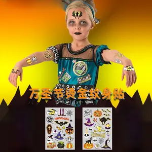 Détail de quatre tatouages temporaires Halloween dorés avec motifs citrouille et fantôme