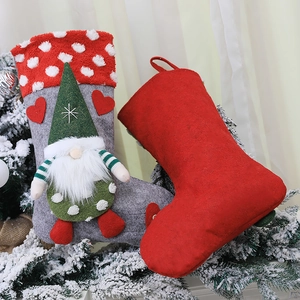 Christmas stocking set with 3D forest gnome doll and polka dot trim on snow background