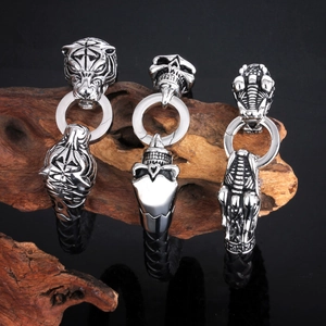 Punk style men's braided leather bracelets with stainless steel tiger and skull charms