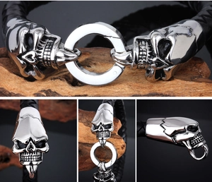 Detailed views of punk skull charms on black braided leather bracelet with steel clasp