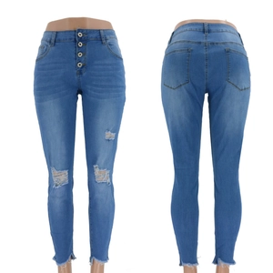Women's blue high-waist stretch ripped denim jeans with a slim fit and four-button fly