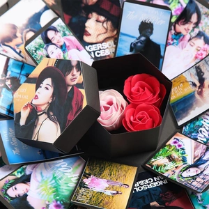 Black hexagonal explosion gift box with artificial roses and personalized photo cards