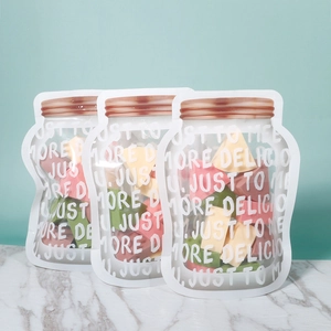 Three packs of multi-colored triangular makeup sponges in clear mason jar shaped bags