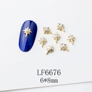 Charm ongle étoile dorée avec perle centrale et strass 6x8mm pour manucure