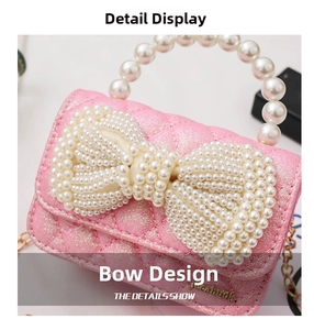 Detail of pink mini quilted bag with large pearl bow and elegant beaded handle