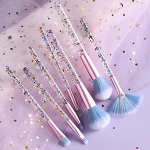 7Pcs glitter quicksand makeup brush set with blue gradient bristles on pink mesh