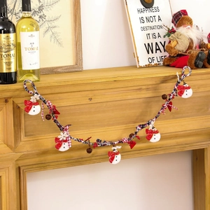 Christmas snowman hanging banner with red scarf, bells and plaid ribbon on wood